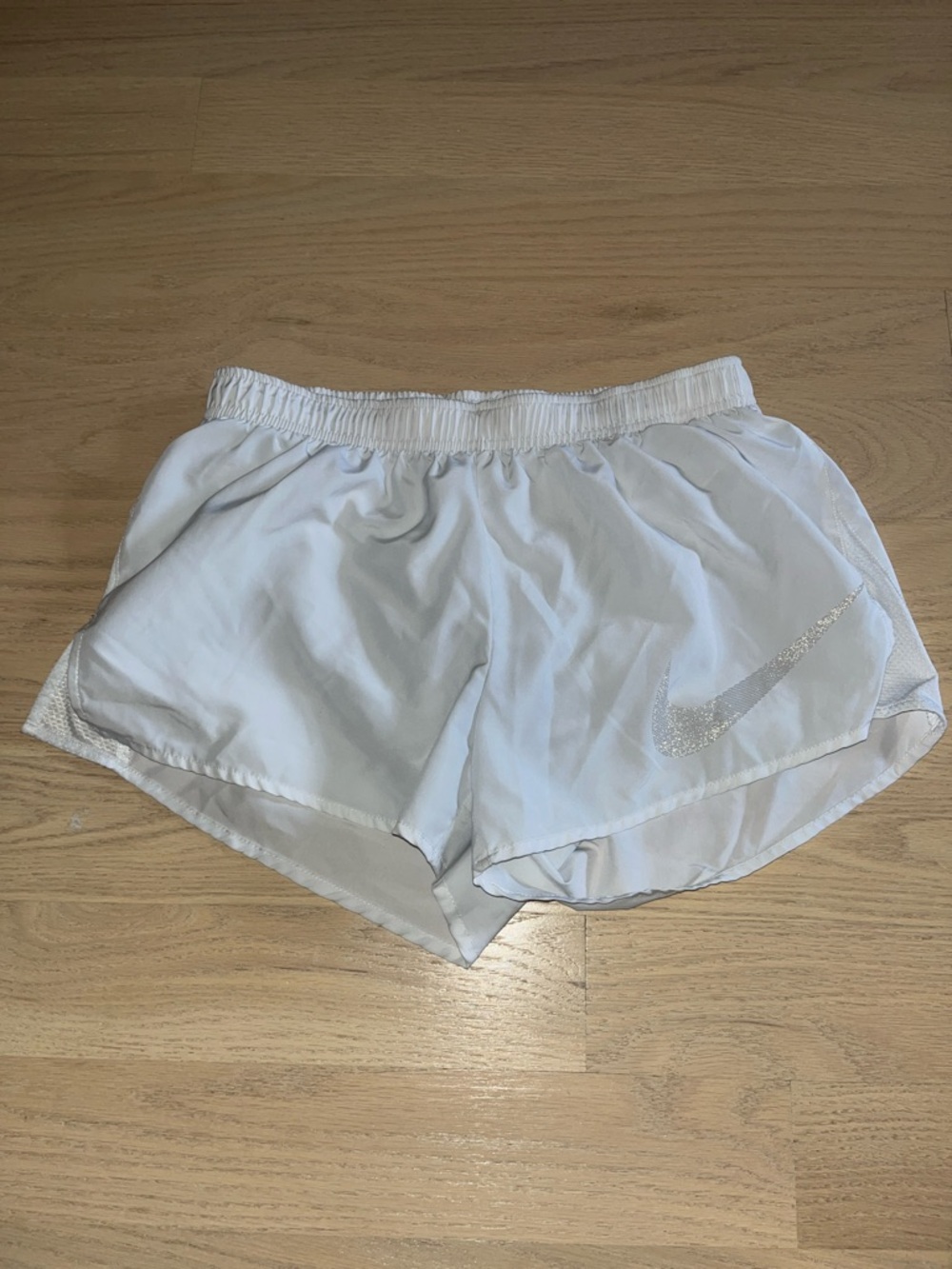 Nike White Women's Athletic Running Shorts with Silver Swoosh